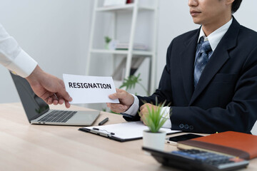 Businessmen send resignation letters to executives or managers. Include information about resignation and vacancies and job changes.