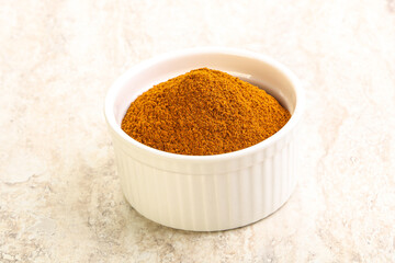 Dry Paprika powder in the bowl