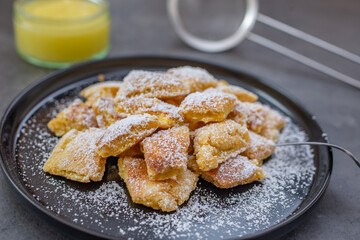 Austrian cuisine. Torn pancake (or omelet) kaiserschmarrn with honey, powdered sugar