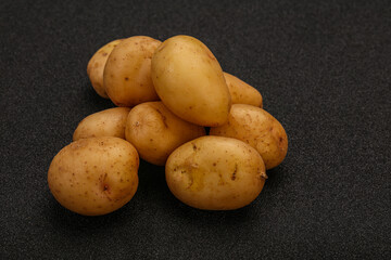 Raw baby young potato heap