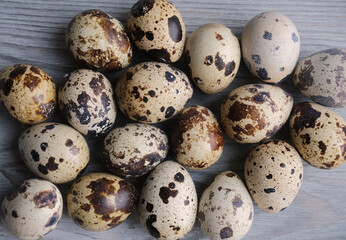 quail eggs on wooden table