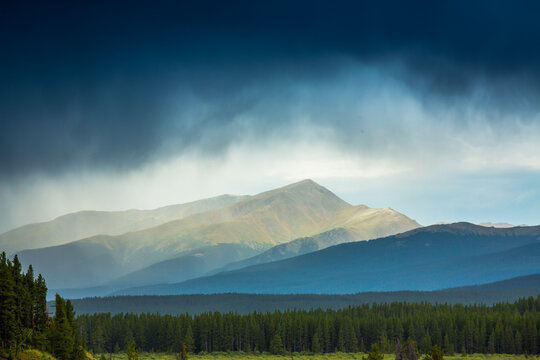 Stormy skies raining over the Rocky Mountains in central Colorado.