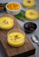 mango-flavored Phirni served in  glass bowls