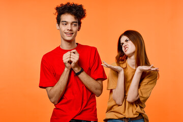 boy and girl colorful t-shirt grimace communication