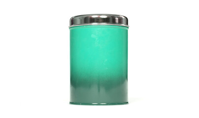 Old green tin can, isolated on white