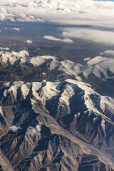 Aerial photos of mountains and snow mountains in Urumqi, Xinjiang Province, China
