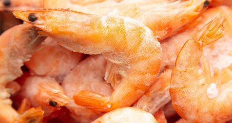 Frozen red shrimps as background.