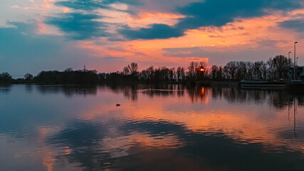 Beautiful sunset with reflections near Plattling, Isar, Bavaria, Germany
