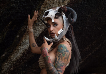 Tattooed masked skull ethnic female pagan shaman