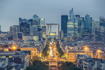 Obraz premium La Defence, Paris business district at dusk.