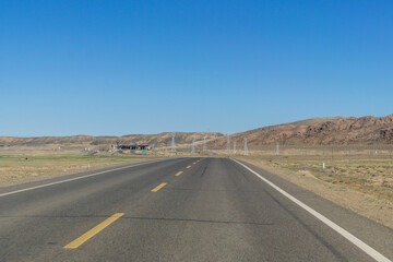 Fototapeta na wymiar Highway in Gobi desert, Tacheng, Xinjiang Province, China
