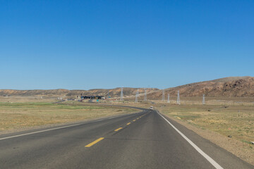 Fototapeta na wymiar Highway in Gobi desert, Tacheng, Xinjiang Province, China