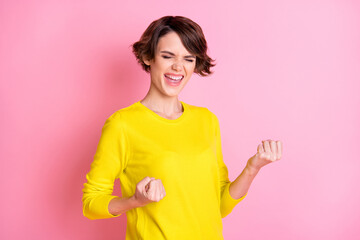 Photo of young happy excited crazy cheerful smiling good mood girl scream in victory isolated on...