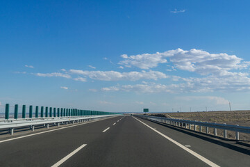 Highway in Gobi desert, Tacheng, Xinjiang Province, China