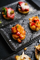 A set of several bars, meat and fruit