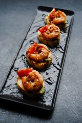 Bruschetta with fried Mediterranean shrimp