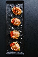 Bruschetta with fried Mediterranean shrimp and sauce