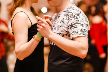 Kharkiv, Ukraine 18.04.21 Man and woman are dancing passionately kizomba at party