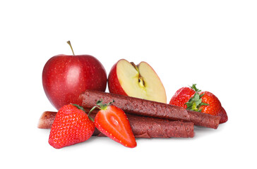 Delicious fruit leather rolls, apples and strawberries  on white background