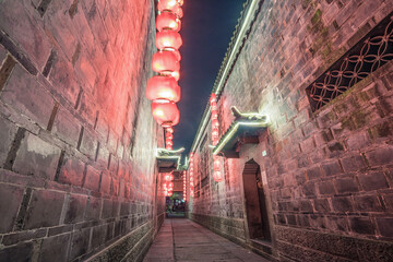 The streets of Jinli in Chengdu, China are lit up with big red lanterns for Chinese New Year