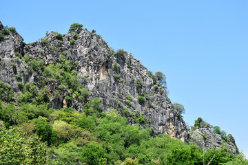 Limestone mountains on white background