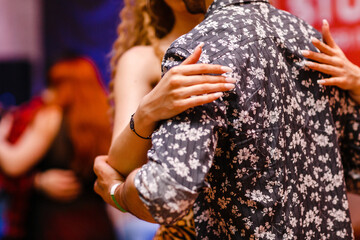 Kharkiv, Ukraine 18.04.21 Man and woman are dancing passionately kizomba at party