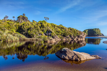 The shores in the smooth water