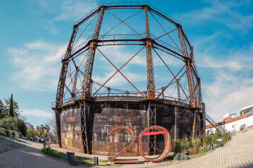 Athens, Attica, Greece. The gasholder at the old gasworks premises at Technopolois - Gazi area in Athens city. Nowadays serves as a major cultural venue