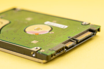 Hard disk on yellow background