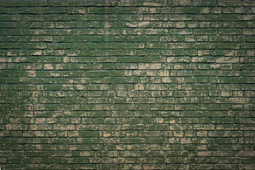 Green painted grunge brick wall texture background