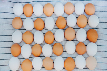 eggs white and brown in staggered pattern