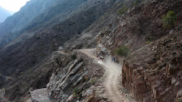 Car driving on dangerous mountain road to Fairy Meadows, Pakistan