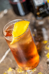 rum with ice and lime, summer concept with a strong shadows, selective focus image