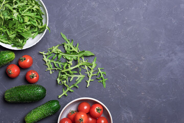 Fresh organic vegetables for healthy food cooking on dark background top view mock up