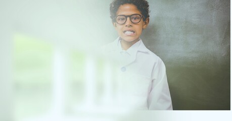Composition of schoolboy in glasses in school laboratory with motion blur