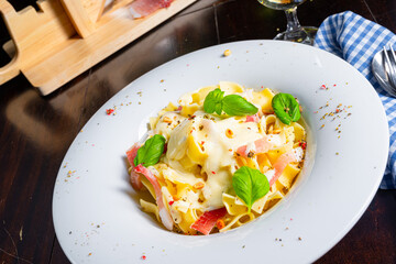 Tagliatelle with gorgonzola masarpone sauce and ham.