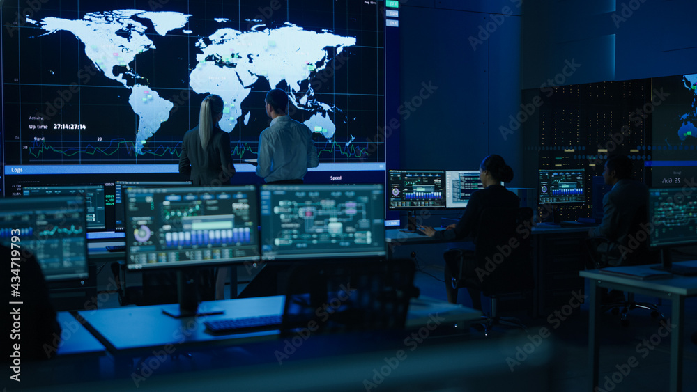 Aufkleber Project Manager Uses Digital Tablet Talks with Computer Scientist Looks at Big Screen Display Showing Infographics Global World Map Data. Telecommunications Control Control Room with People Working