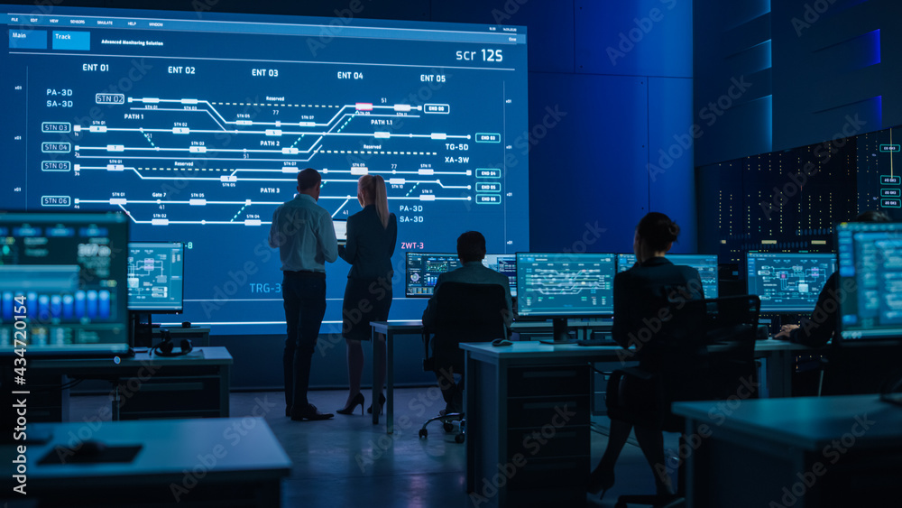 Aufkleber Telecommunications Company System Control and Monitoring Room with Diverse Multicultural Team of Professionals Working on Computers. Big Screen Display Showing Infrastructure Infographics. Back View