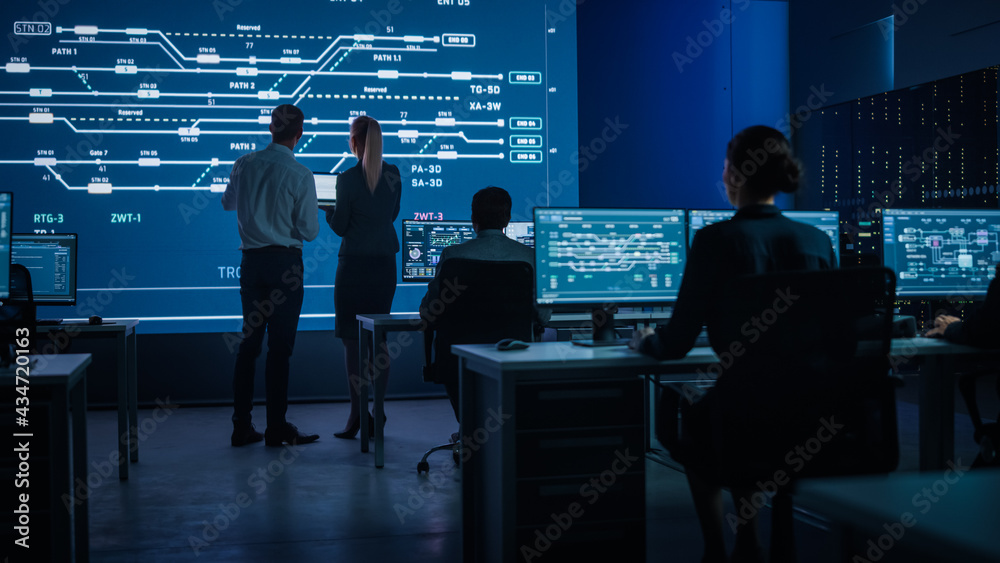 Aufkleber Telecommunications Company System Control and Monitoring Room with Diverse Team of Professionals Working on Personal Computers. Big Screen Display Showing Infrastructure Infographics and Data