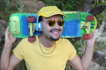 Skater with colorful outfit listening to music