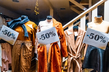 Discounted clothes in a shop window