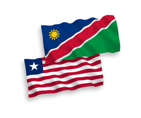 National vector fabric wave flags of Republic of Namibia and Liberia isolated on white background. 1 to 2 proportion.