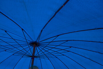 The blue monochromatic picture of the umbrella.

