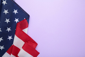 American flag on purple background with copy space