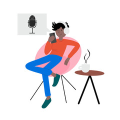 Chilling male in modern chair listening to podcast or online show via mobile phone and app, drinking coffee