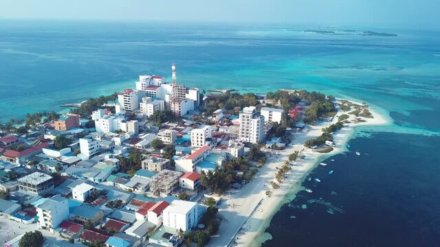4K Footage Aerial View to the Maafushi Island local beach, Maldives