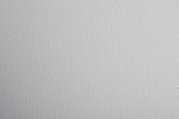 Blank white canvas as background, closeup view