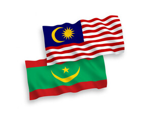 National vector fabric wave flags of Islamic Republic of Mauritania and Malaysia isolated on white background. 1 to 2 proportion.