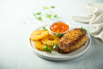 Grilled turkey with pineapple and mango sauce