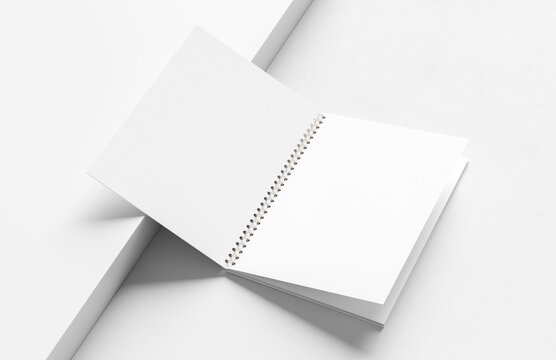 Spiral binder notebook mock up isolated on modern white background. 3D illustration